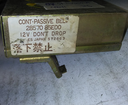 1989-1991 Nissan Maxima seat belt module computer 28570 85E00