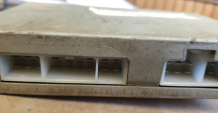1992-1994 Nissan Maxima seat belt control module computer 28570 85E10