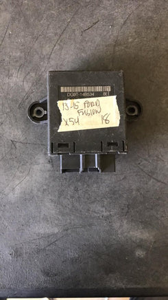 2013-2015 Ford Fusion door module DG9T 14B534 BE