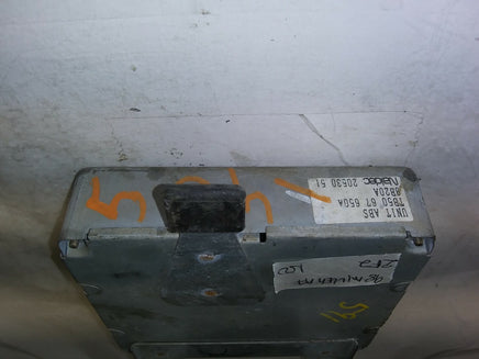 1998 Mazda Millenia ABS control module TB50 67 650A